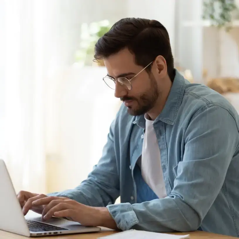 Man researching redundancy cover