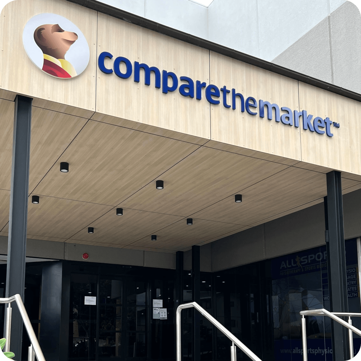 Compare the Market sign at office entrance